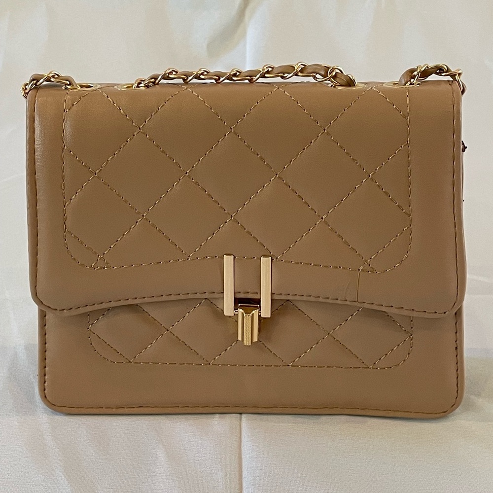 Small beige leather handbag gold hardware